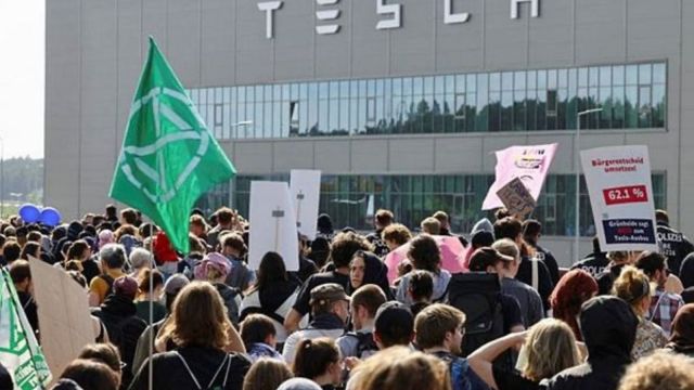 Demonstrators protest against the expansion of the Tesla Gigafactory, in Gruenheide near Berlin, Germany. (Reuters Photo)