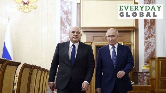 Russian President Vladimir Putin and Prime Minister Mikhail Mishustin arrive for a meeting with members of the government in Moscow, Russia May 6, 2024.