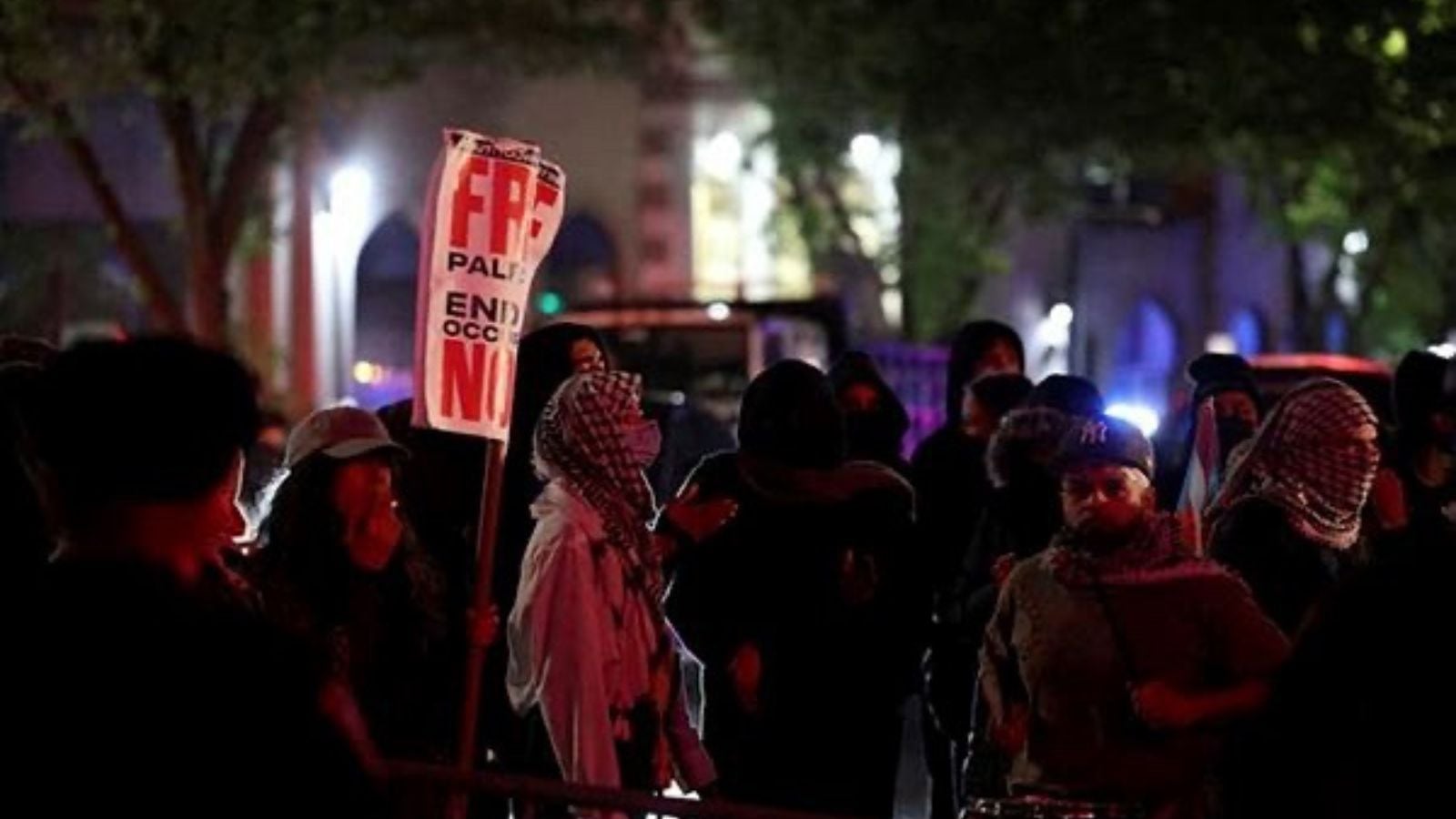 Police stand guard near an encampment of protesters supporting Palestinians on the grounds of Columbia University, during the ongoing conflict between Israel and the Palestinian Islamist group Hamas, in New York City. (Reuters Photo)