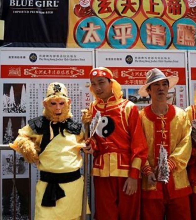 The festival features a traditional parade of children in costume of carried on stands above the heads of the crowd in the afternoon.
