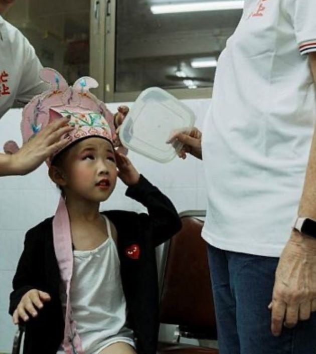 This is followed by a midnight climbing competition with participants scrambling up towers of buns more than ten meters high.