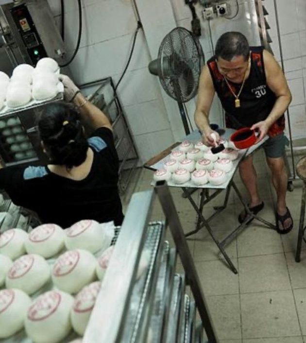 Meanwhile, serpentine queues  were seen outside shops selling steam buns and stores stocked with bun-themed souvenirs.