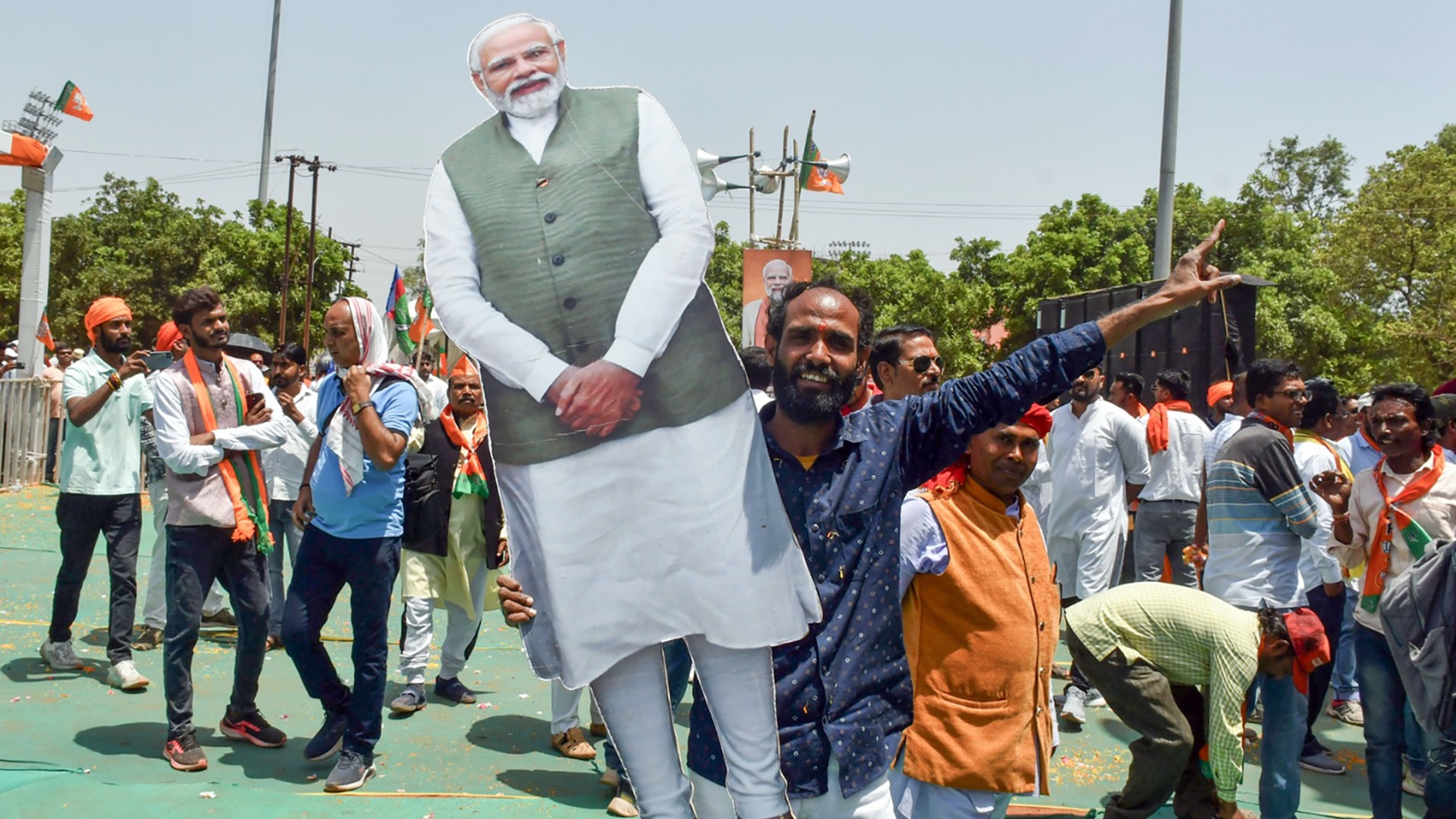 A BJP supporter in Ranchi with a PM Narendra Modi cutout