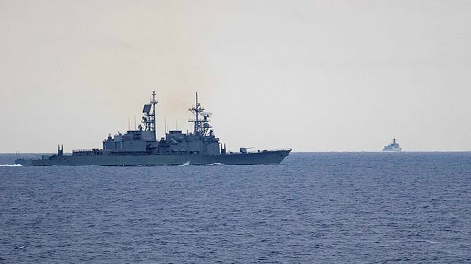 In this photo released by the Taiwan Ministry of National Defense, Taiwan guided missile destroyer Ma Kong DDG1805, left, monitors Chinese guided missile destroyer Xi'an DDG15, right, near Taiwan on Thursday, May 23, 2024. Taiwan tracked dozens of Chinese warplanes and navy vessels off its coast Friday on the second day of a large exercise China's People's Liberation Army held in response to the inauguration of the island's new leadership