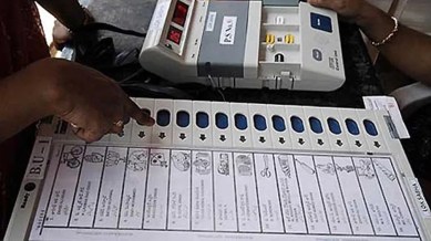 EVM malfunctioning, Etah EVM malfunctioning, UP boy voted 8th times, FIR lodged against boy, UP voter viral vide, Etah, Uttar Pradesh, model code of conduct, MCC violation, indian express news