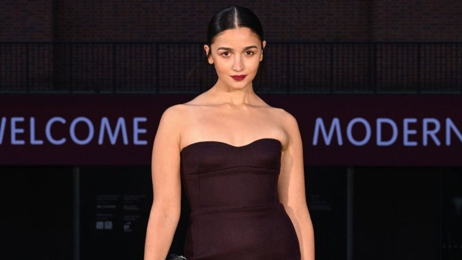 Alia Bhatt‍‍`s black dress, bold red lips make heads turn at Gucci Cruise Show