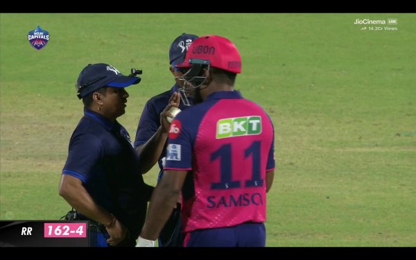 Samson walked back to the on-field umpires to 'review' the third umpire's decision. (BCCI) 