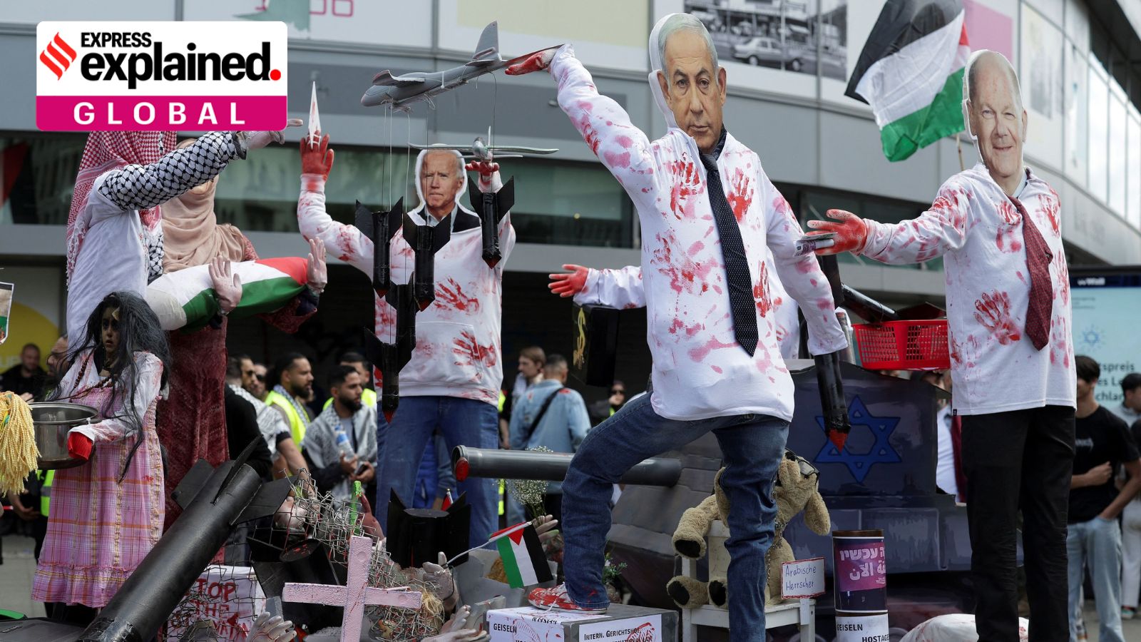 Masks depicting Israeli Prime Minister Benjamin Netanyahu, U.S. President Joe Biden and German Chancellor Olaf Scholz are on a stage set by protesters during a pro-Palestinian demonstration, amid the ongoing conflict between Israel and Palestinian Islamist group Hamas, in Berlin, Germany, May 4, 2024. REUTERS/Lisi Niesner
