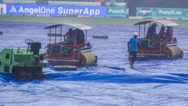 IPL Match Today: Groundsmen place covers on the pitch as its rains, a day before the IPL match between Sunrisers Hyderabad and Punjab Kings, at Rajiv Gandhi International Stadium, in Hyderabad. (PTI)
