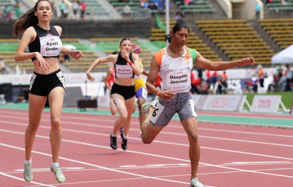 Deepthi Jeevanji crosses the finish line to win the gold medal with a new world record timing of 55.07 seconds in the women’s T20 400 m final in the World Para Athletics Championships in Kobe, Japan. (Paralympic Committee of India)