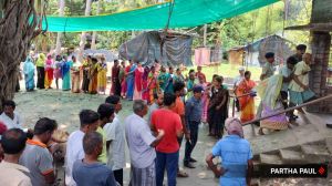 Lok Sabha Elections Phase 6 Live Updates: Voters line up at a polling station in West Bengal's Purba Medinipur constituency. (Express photo by Partha Paul)