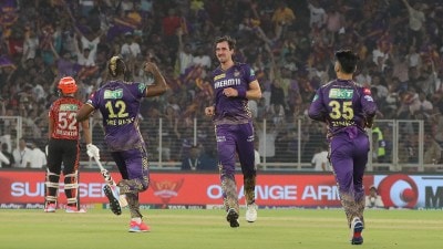 KKR's Mitchell Starc celebrates the wicket of Shahbaz Ahmed at the Narendra Modi Stadium in Ahmedabad. (Express photo by Nirmal Harindran)