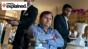 Ajay Gupta, center, during a lunch interview while in self-imposed exile, in Dubai, United Arab Emirates, Oct. 9, 2018.