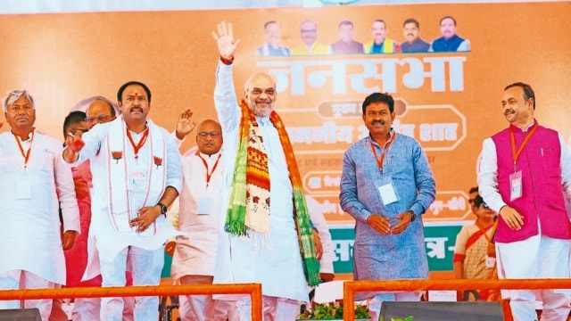 Union Home Minister Amit Shah with BJP MP and MoS Ajay Mishra Teni in Lakhimpur Kheri on Wednesday.