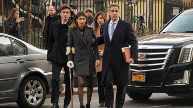 Michael Cohen, right, the former lawyer for President Donald Trump, walks with family members to federal court in Manhattan, Dec. 12, 2018.