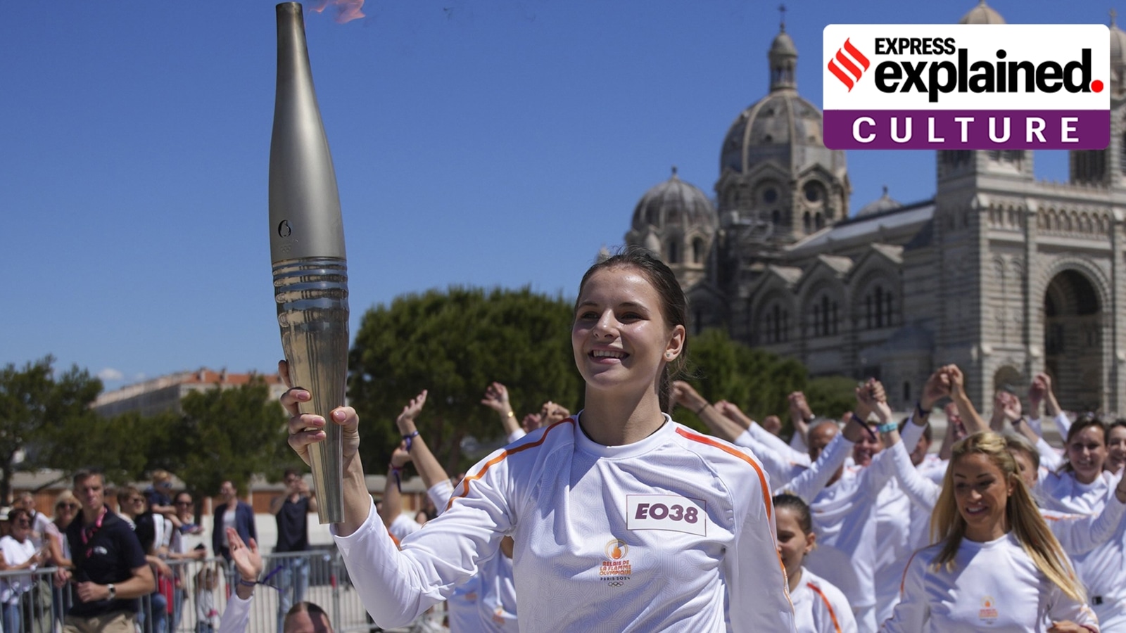 Ukrainian gymnast Maria Vysotchanska participates in the Olympic torch relay in Marseille on Thursday.