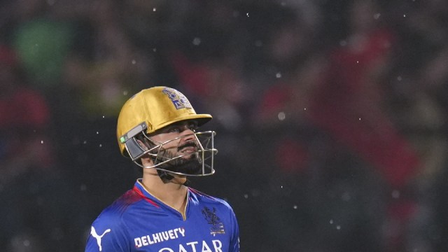 IPL match, RCB vs DC weather update: Royal Challengers Bengaluru's Virat Kohli reacts as rain stops play during an Indian Premier League (IPL) 2024 T20 cricket match between Punjab Kings and Royal Challengers Bengaluru, at HPCA Stadium, in Dharamshala, Thursday, May 9, 2024. (PTI Photo)