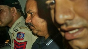Delhi CM Arvind Kejriwal's aide Bibhav Kumar being taken to custody by Delhi Police after his medical test in the case of alleged assault on AAP MP Swati Maliwal, in New Delhi, Saturday, May 18. (PTI)