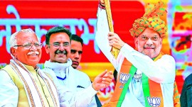 Union Home Minister and BJP leader Amit Shah with former Haryana chief minister Manohar Lal Khattar during an election rally in Karnal on Monday