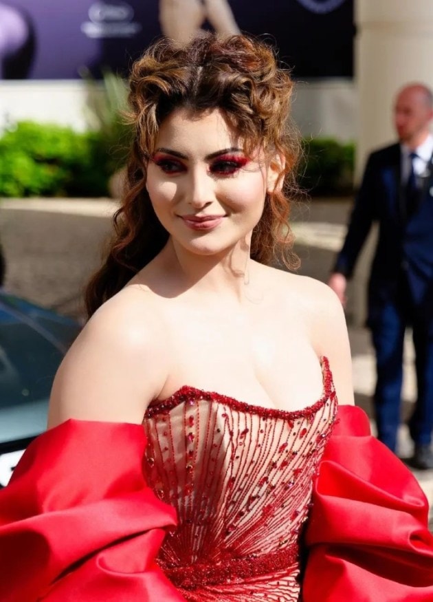 Fans sent praises galore as she shared photographs on her social media. Urvashi is known for her bold extravagant looks. Her bold red eye make up cannot be missed.