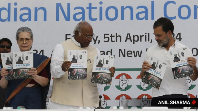 Congress president Mallikarjun Kharge releases the party's manifesto for the Lok Sabha elections along with party leaders Sonia and Rahul Gandhi. (Express file photo by Anil Sharma)