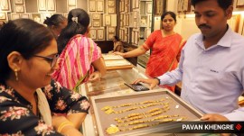 People are seen buying gold On the occasion of Akshay Tritiya on Friday. (Express Photo By Pavan Khengre)