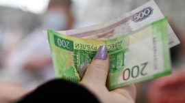 The proposal involves a progressive tax on personal incomes and represents a change of course from the current flat-rate tax that was credited with bringing order and improving tax collections after it was introduced in 2001. (File Photo)