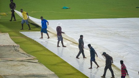 Pitch being covered during rains on the eve of the Indian Premier League (IPL) final match between Kolkata Knight Riders and Sunrisers Hyderabad, at MA Chidambaram Stadium, in Chennai