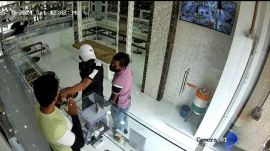 According to the police, five to six masked men carrying weapons entered the jewellery shop, threatened the shop owner and his employee by pointing weapons, thrashed them and looted the shop.