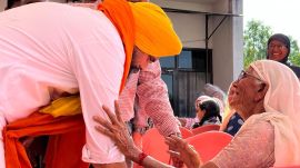 Clad in a white kurta and pyjama with AAP's yellow turban, 45-year-old Kang