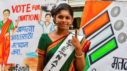 : A student takes part in a voting awareness campaign during the ongoing Lok Sabha elections, in Mumbai,