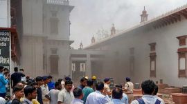 Smoke billows out after fire broke out at the Patna Museum, in Patna,