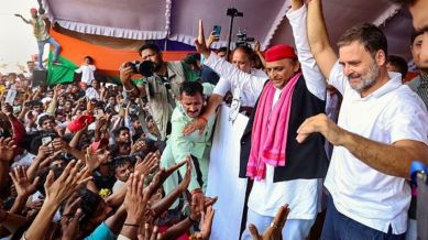 Samajwadi Party President Akhilesh Yadav and Congress leader Rahul Gandhi during public rally for Lok Sabha polls, in Phulpur,