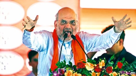 Amit shah, Shah commments on PoK, Pakistan Occupied Kashmir, amit shah poll rally, amit shah poll speeches, Hemant Savra, BJP poll frally in palghar, reserved Scheduled Tribe constituency, Bharati Kamadi, shiv sena, NCP, BJP, Lok Sabha elections 2024, indian express news