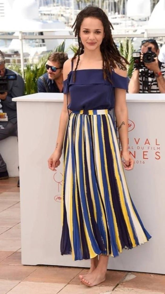 Sasha Lane walks barefoot at Cannes in 2016. The internet praised her for this action
