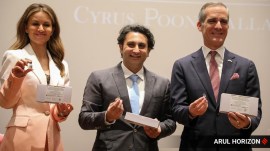 Eric Garcetti, US Ambassador to India with Adar and Natasha Poonawalla during the flag-off ceremony of the R21 malaria vaccine and Discussions around Indo-US collaborations and R21 malaria vaccine at Serum Institute of India on Monday. (Express photo by Arul Horizon)