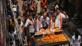 Tejasvi Surya, Surya attacks on Kejriwal, arvind kejriwal, arvind kejriwal arrest, delhi BJJP roadshow, surya at delhi roadshow, indian express news
