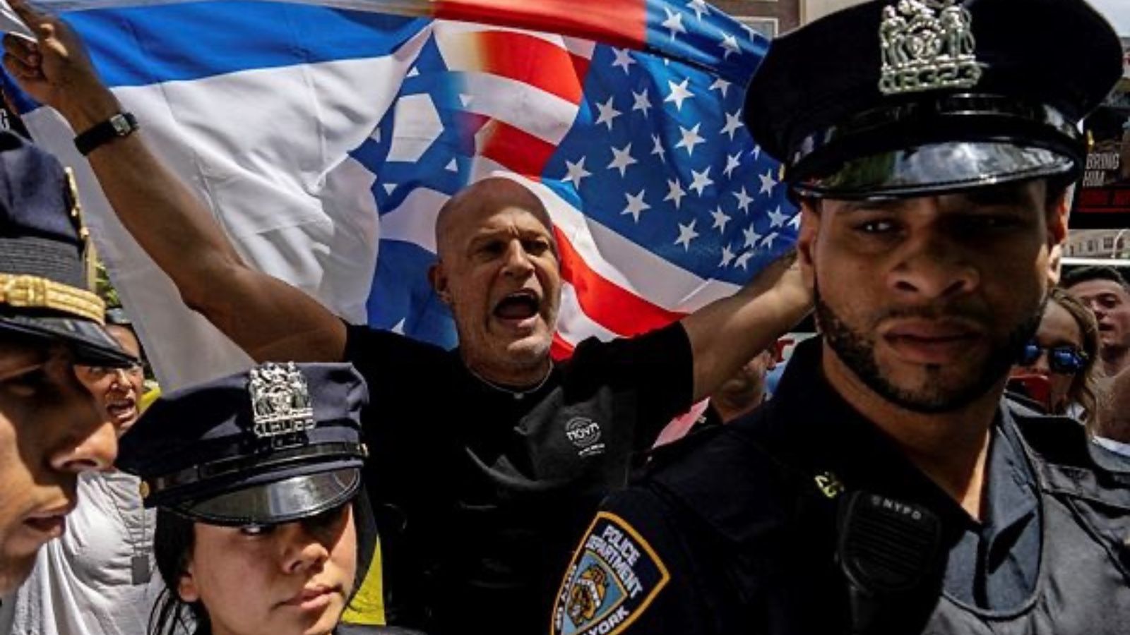 Police officers keep pro-Palestinians and pro-Israel protestors apart during the Israel Day on Fifth event, amid the ongoing conflict between Israel and the Palestinian Islamist group Hamas in Gaza. (Reuters)