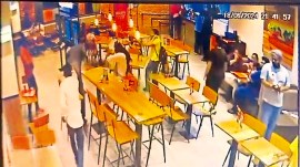 2firing-3col Burger King shootout, delhi burger king shootout, Burger King shooting video, Rajouri Garden Burger King, Rajouri Garden Burger King shooting, Rajouri Garden Burger King shooting news, Man dead shootout at Rajouri Garden Burger King, delhi news, India news, Indian express