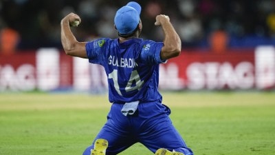 Afghanistan's Gulbadin Naib celebrates after defeating Australia by 21 runs in their men's T20 World Cup cricket match at Arnos Vale Ground, Kingstown, Saint Vincent and the Grenadines, Saturday, June 22, 2024. (AP Photo)