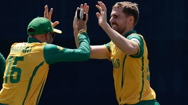 South Africa's Anrich Nortje, right, celebrates with teammate Keshav Maharaj after the dismissal of Sri Lanka's Charith Asalanka during the ICC Men's T20 World Cup cricket match between South Africa and Sri Lanka at the Nassau County International Cricket Stadium in Westbury, New York, Monday, June 3, 2024. (AP/PTI)