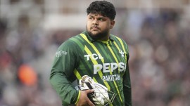 Pakistan's Azam Khan walks back to the changing rooms after losing his wicket during the fourth IT20 match between England and Pakistan in London, England