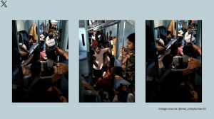 Passengers crowd sleeper coach of a superfast express train