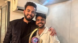Elvish Yadav and Love Kataria with Bigg Boss OTT 2 trophy