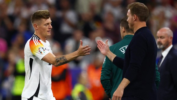 Germany's Toni Kroos shakes hands with coach Julian Nagelsmann after being substituted, Euro 2024