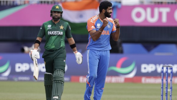 India's Jasprit Bumrah, right, celebrates the dismissal of Pakistan's Iftikhar Ahmed, left, during the ICC Men's T20 World Cup cricket match between India and Pakistan at the Nassau County International Cricket Stadium in Westbury, New York