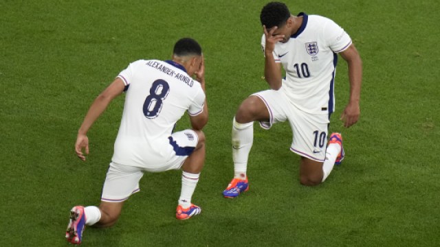 England's Jude Bellingham celebrates with Trent Alexander-Arnold after scoring his side's winner against Serbia at the Euro 2024 tournament in Gelsenkirchen on Sunday. (AP Photo)