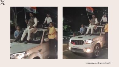 Parliamentary Minister sits on the roof of a traveling vehicle and flaunts the national flag as India gives up the T20 World Cup 2024 trophy