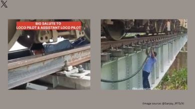 Indian Railways employees risk their lives to fix air leakage