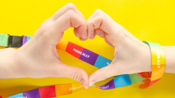 Aliado LGBTQIA+ Aqui estão algumas maneiras de incentivar a aliança no local de trabalho.  (Fonte Adobe Stock)
